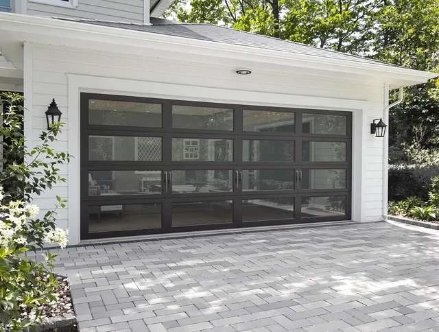 Orange Garage Door Repair design specialist presenting custom garage door options to Orange homeowner