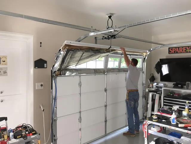 Garage door section replacement by Orange Garage Door Repair in Orange