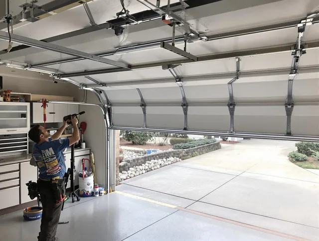 Garage door track repair service by Orange Garage Door Repair in Orange